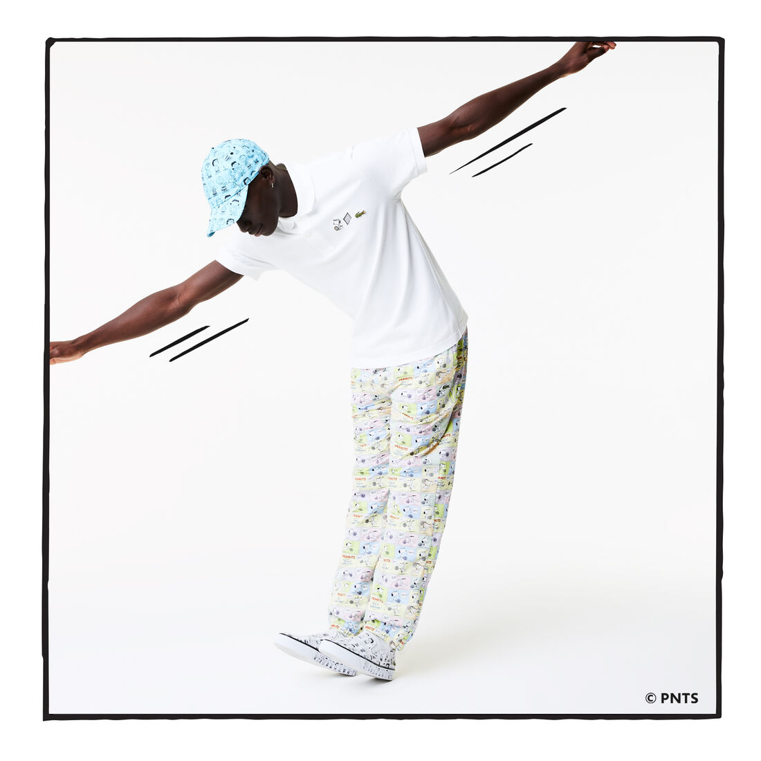 قميص بولو من القطن العضوي الرجالي من مجموعة Lacoste x Peanuts