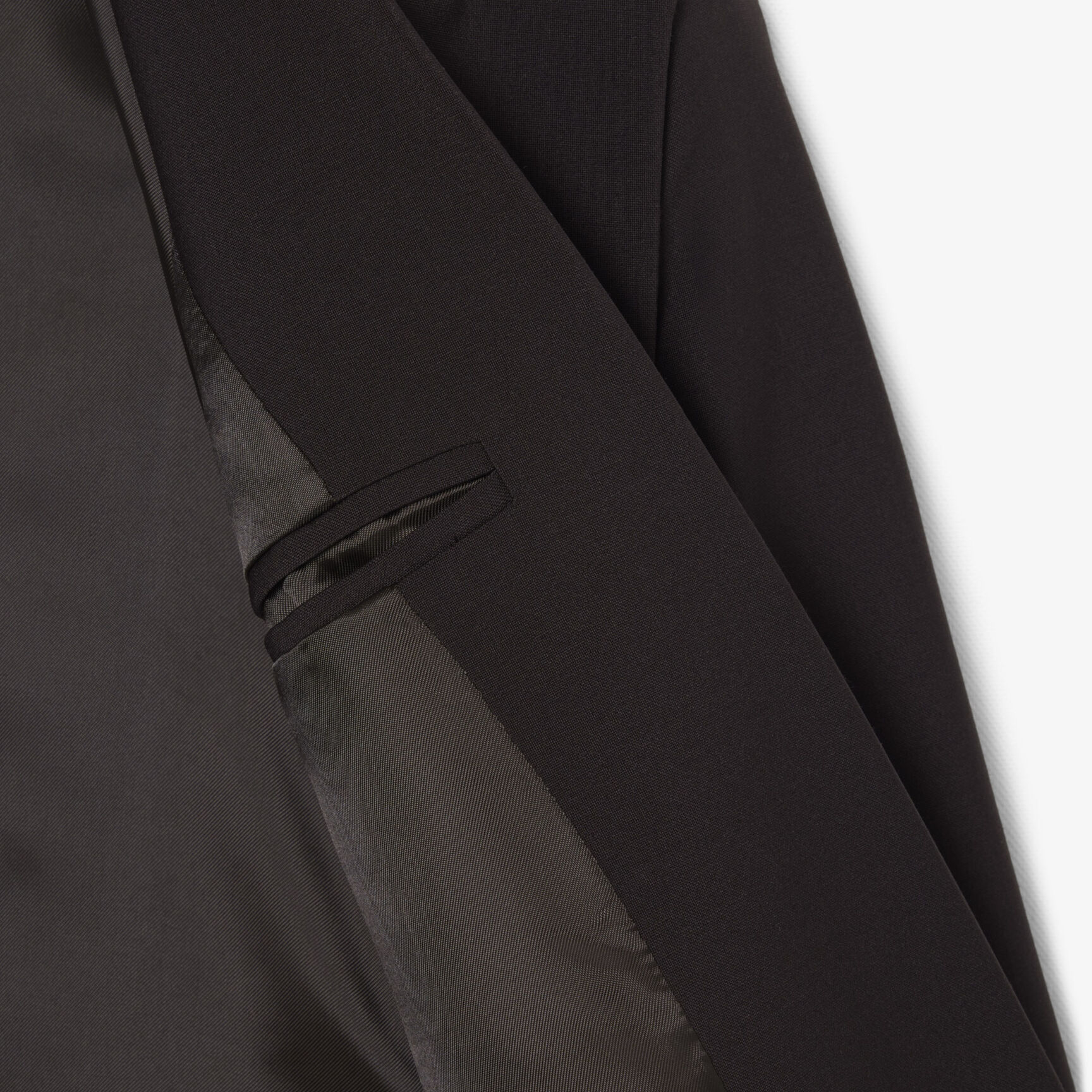 بليزر صوفي ضيق بشعار الماركة مطرز