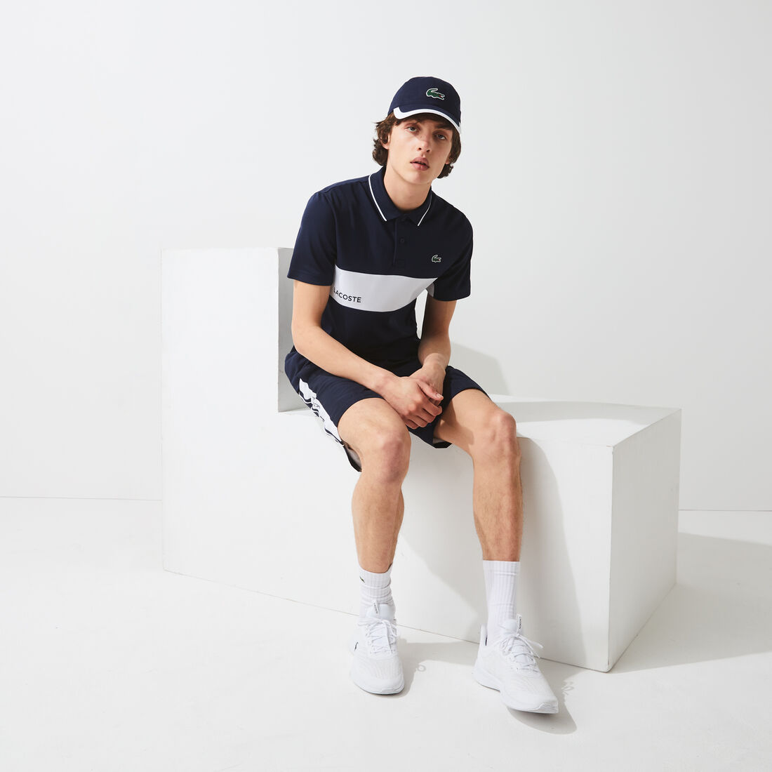 قميص بولو مقاوم مسامي للرجال مع كتل لونية مجموعة Lacoste SPORT قميص بولو مقاوم مسامي للرجال مع كتل لونية مجموعة Lacoste SPORT
