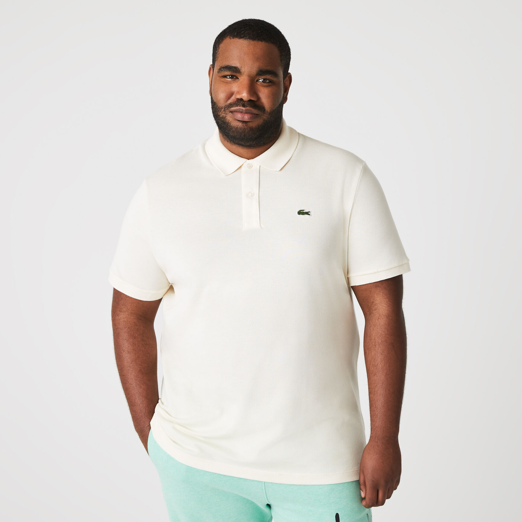 قميص بولو بيكيه بقصة ضيقة L.12.12 قميص بولو بيكيه بقصة ضيقة L.12.12