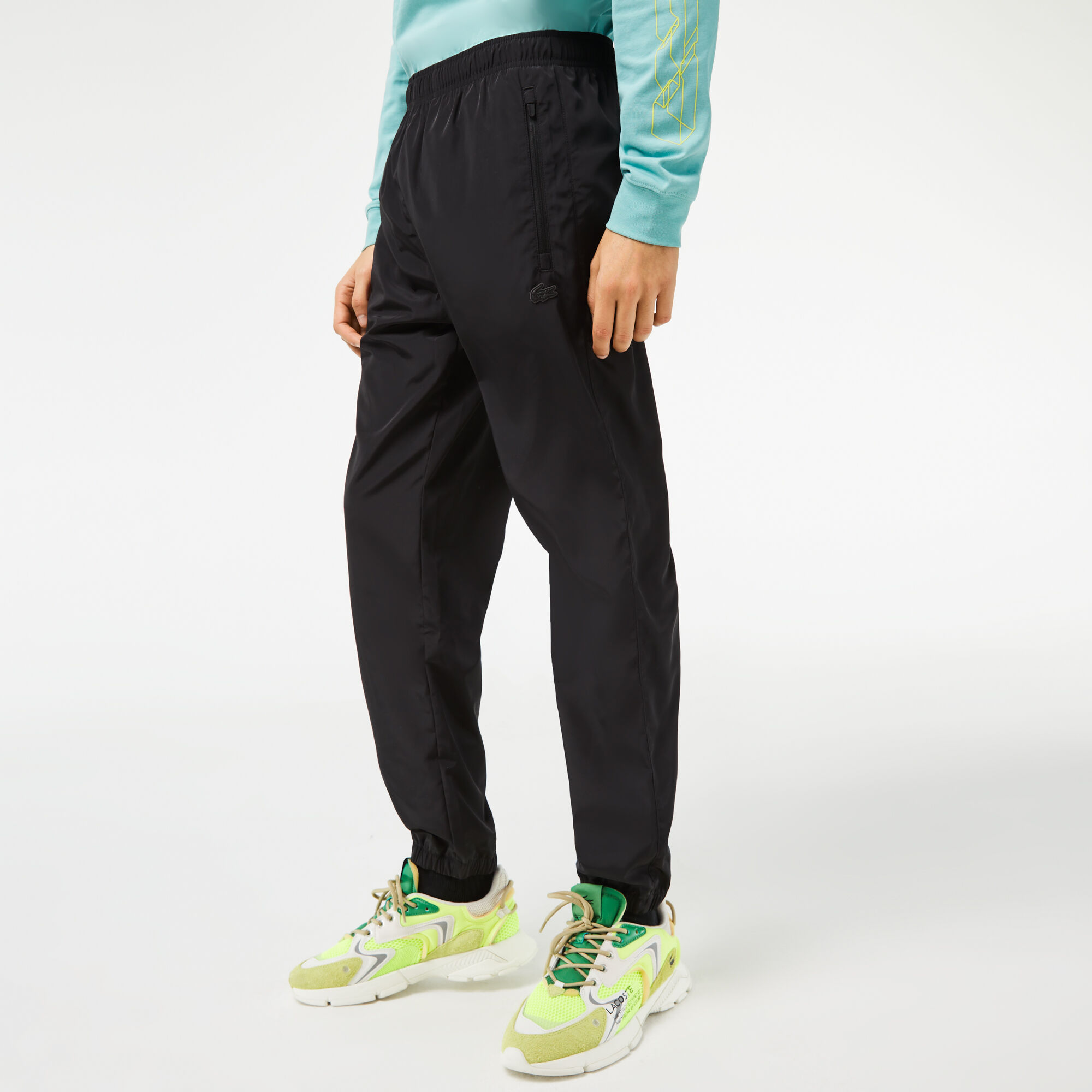 Grey lacoste guppy track pants shop