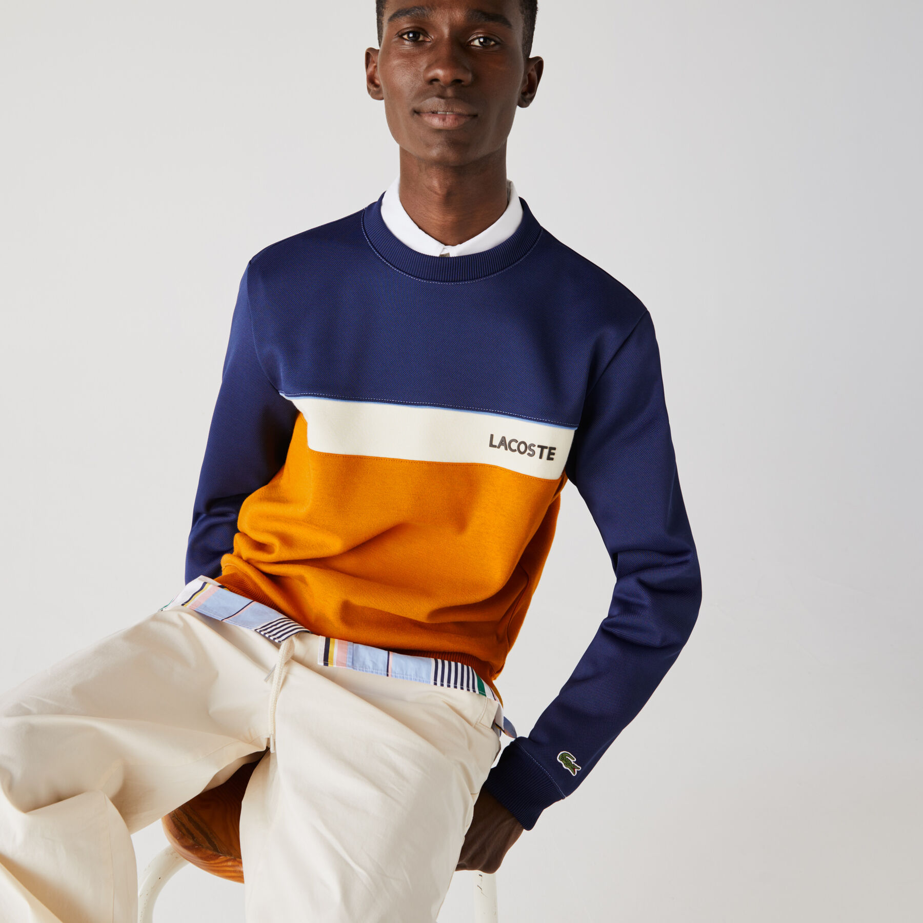lacoste men s crew neck lettering colourblock piqu  sweatshirt