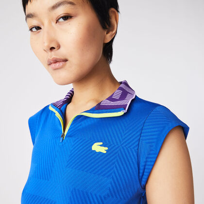 تيشيرت بولو تنس بياقة عالية بسحّاب للنساء من مجموعة Lacoste Sport