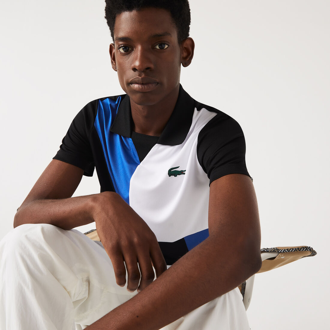تيشيرت بولو تنس بيكيه سريع الجفاف بتصميم مقسم بألوان للرجال مجموعة Lacoste SPORT تيشيرت بولو تنس بيكيه سريع الجفاف بتصميم مقسم بألوان للرجال مجموعة Lacoste SPORT