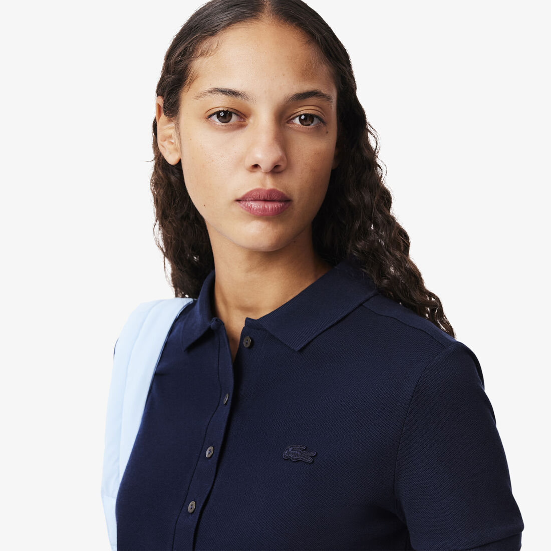 تيشيرت بولو L.12.D بقصة ضيقة من قماش بيتي بيكيه المطاطي تيشيرت بولو L.12.D بقصة ضيقة من قماش بيتي بيكيه المطاطي