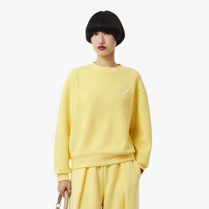 قميص رياضي واسع من قماش إنترلوك