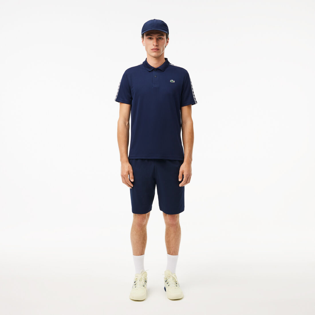 قميص بولو للتنس مخطط بشعار الماركة فائق الجفاف قميص بولو للتنس مخطط بشعار الماركة فائق الجفاف