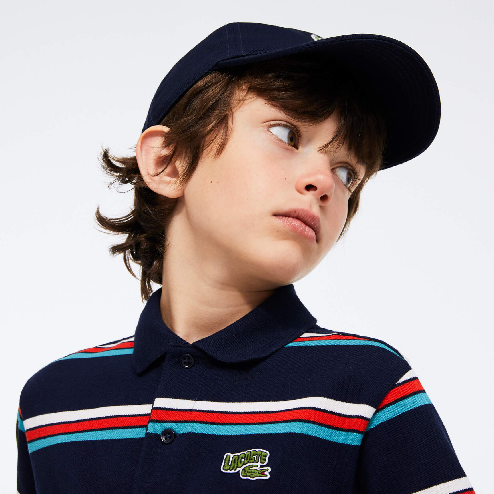قميص بولو للصبيان مقلم من قطن بيكيه بعلامة Lacoste قميص بولو للصبيان مقلم من قطن بيكيه بعلامة Lacoste