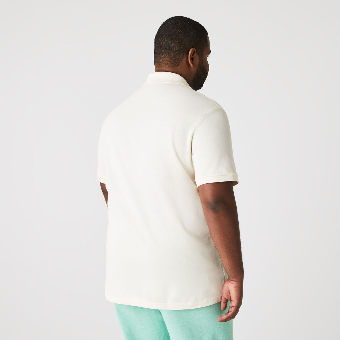 قميص بولو بيكيه بقصة ضيقة L.12.12 قميص بولو بيكيه بقصة ضيقة L.12.12