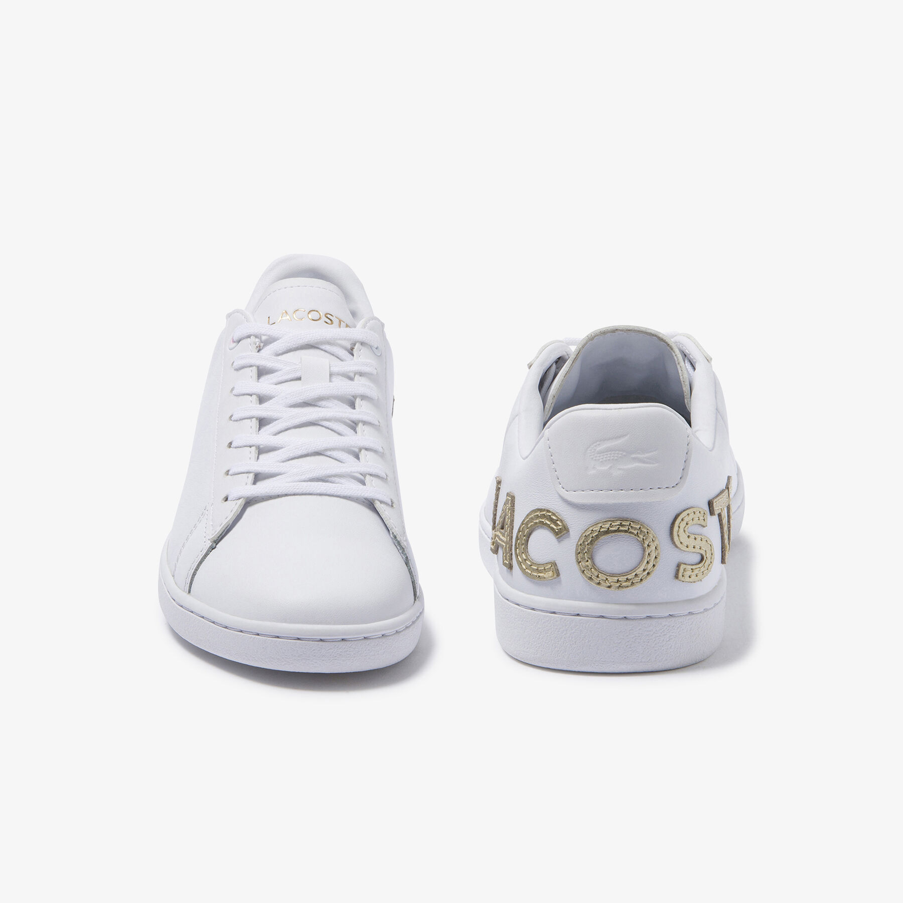 lacoste women s carnaby evo tonal leather and synthetic trainers