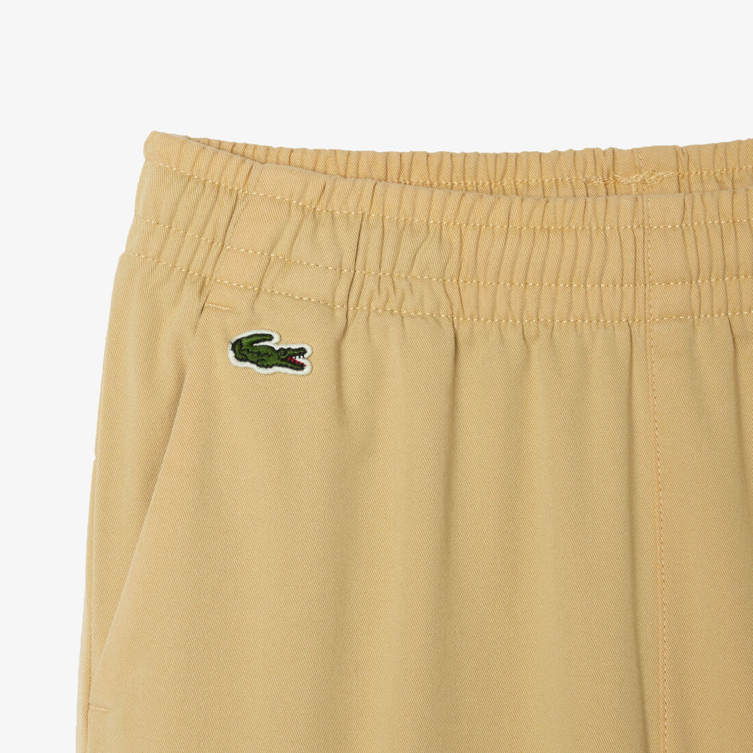 بنطال تشينو للأولاد من قطن الجبردين المطاطي من لاكوست بنطال تشينو للأولاد من قطن الجبردين المطاطي من لاكوست