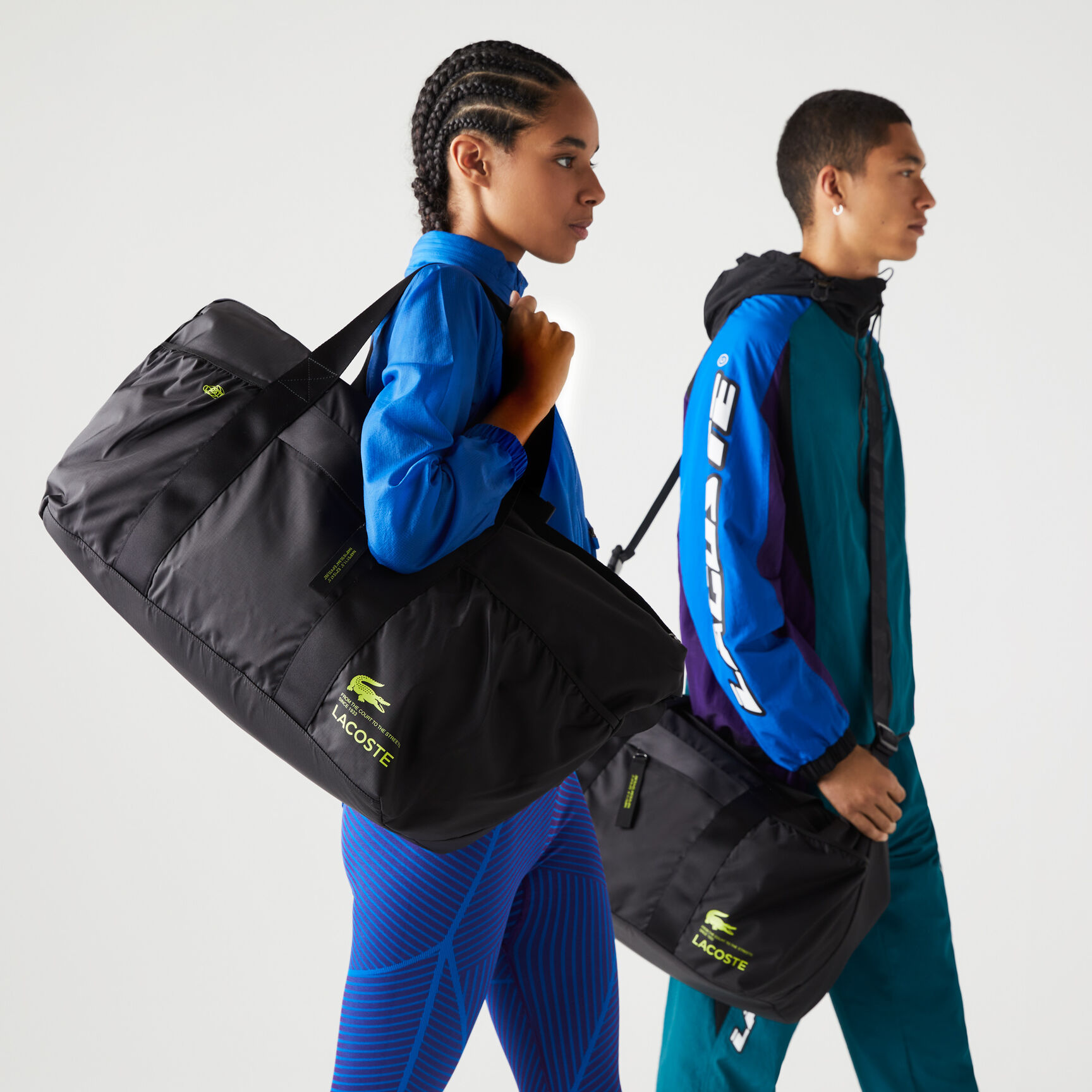 حقيبة لعطلات نهاية الأسبوع بشعار لاكوست بلون مغاير للجنسين حقيبة لعطلات نهاية الأسبوع بشعار لاكوست بلون مغاير للجنسين