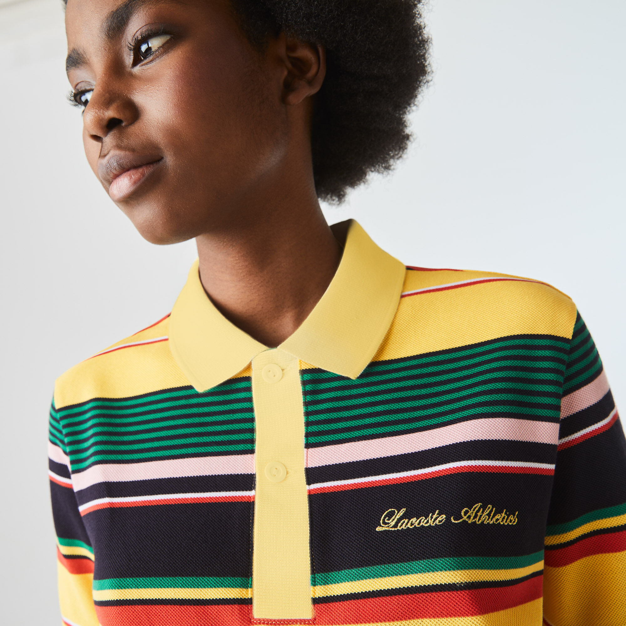 قميص بولو مقلم مطرز من بيكيه القطن مجموعة Lacoste LIVE للجنسين قميص بولو مقلم مطرز من بيكيه القطن مجموعة Lacoste LIVE للجنسين