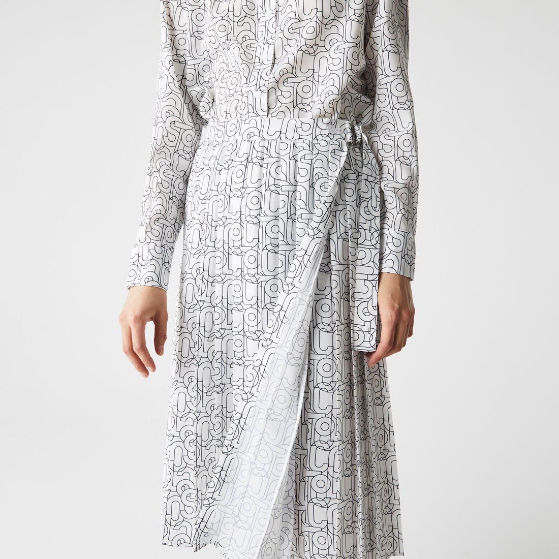 تنورة نسائية متوسطة الطول بطيات منقوشة من Lacoste تنورة نسائية متوسطة الطول بطيات منقوشة من Lacoste