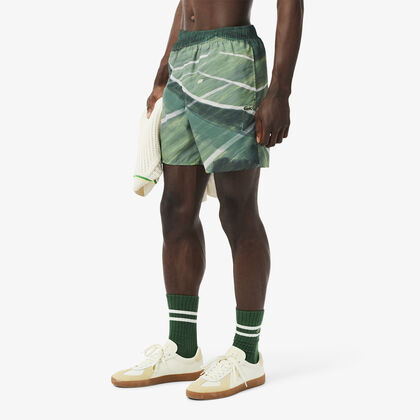 شورت سباحة متوسط ​​الطول وسريع الجفاف