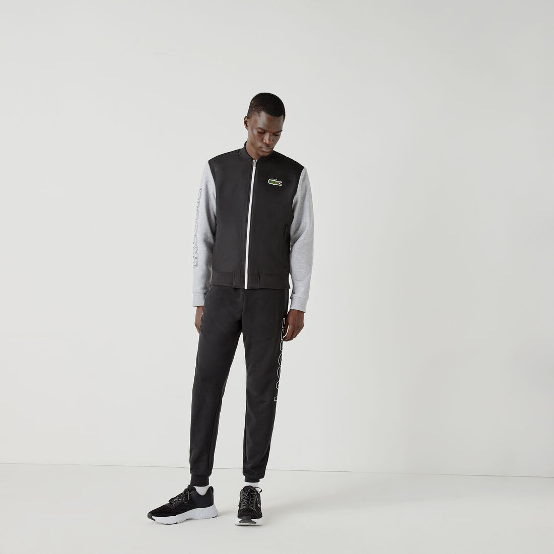 جاكيت تيدي بسحاب من الصوف مع طبعة ثنائية اللون للرجال من مجموعة Lacoste SPORT جاكيت تيدي بسحاب من الصوف مع طبعة ثنائية اللون للرجال من مجموعة Lacoste SPORT