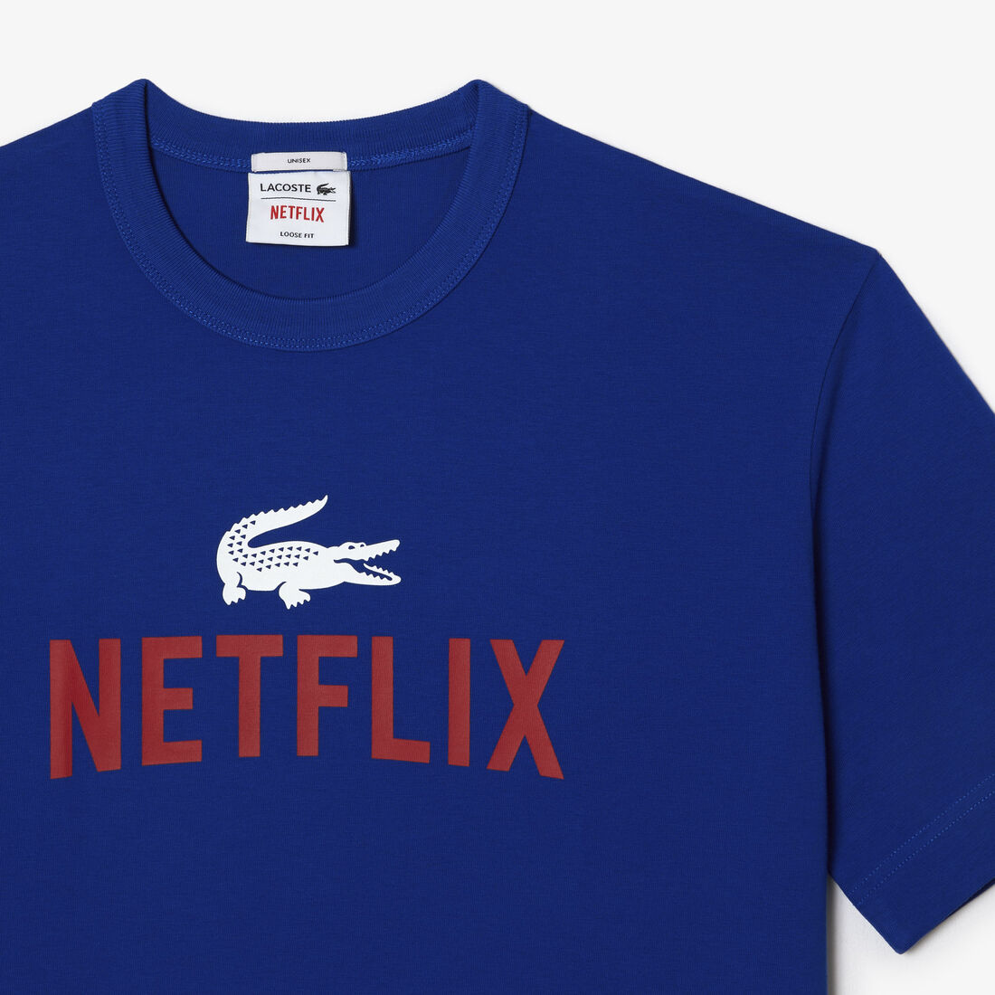 تيشيرت قطن عضوي بقصة فضفاضة للجنسين مجموعة Lacoste x Netflix تيشيرت قطن عضوي بقصة فضفاضة للجنسين مجموعة Lacoste x Netflix