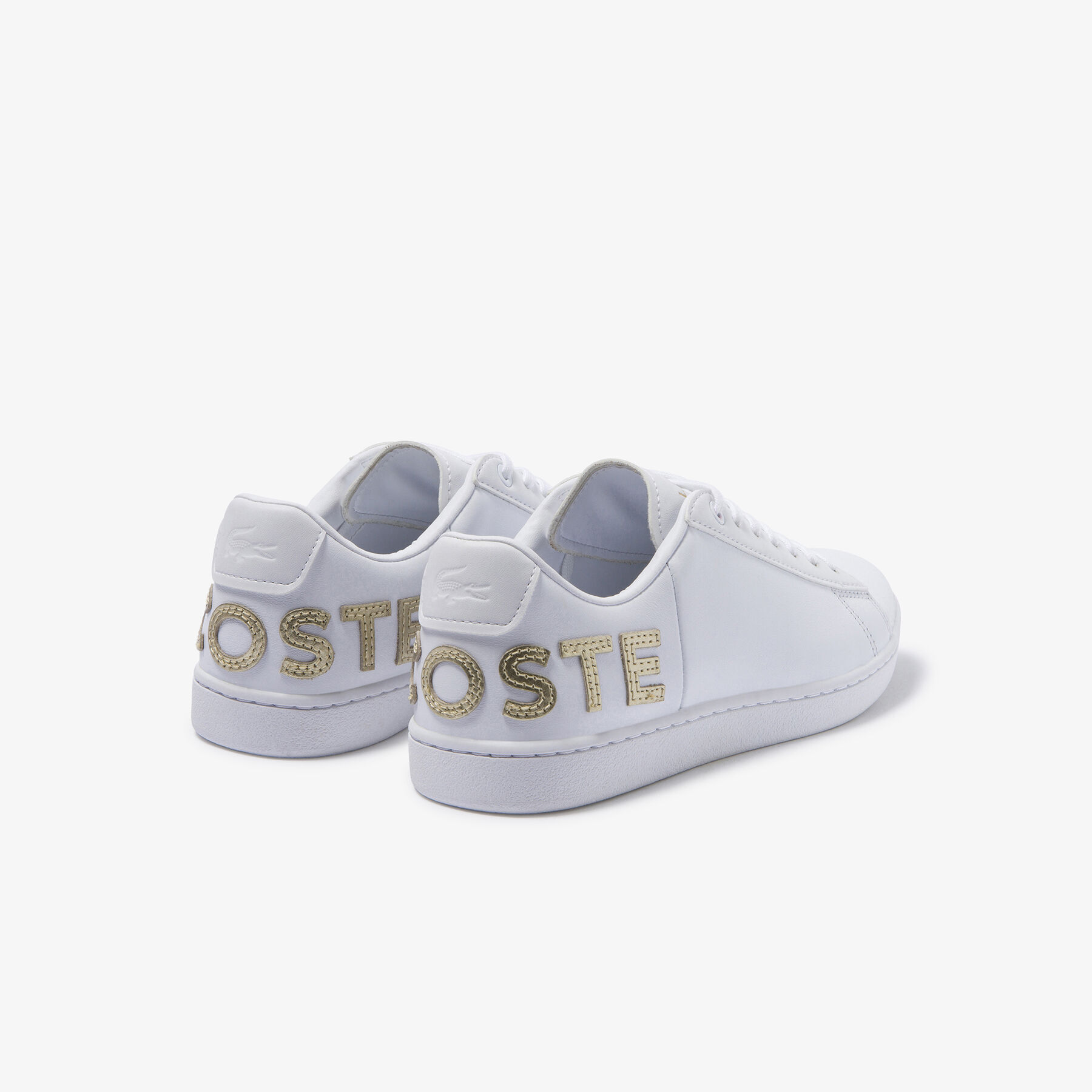 lacoste women s carnaby evo tonal leather and synthetic trainers