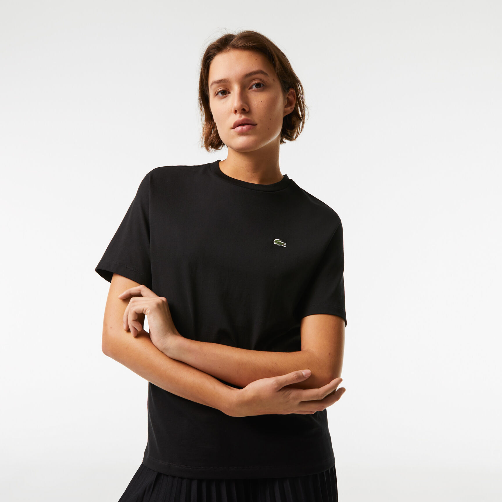 تي شيرت قطن بقصّة فضفاضة وفتحة رقبة على شكل حرف V&rlm; للنساء