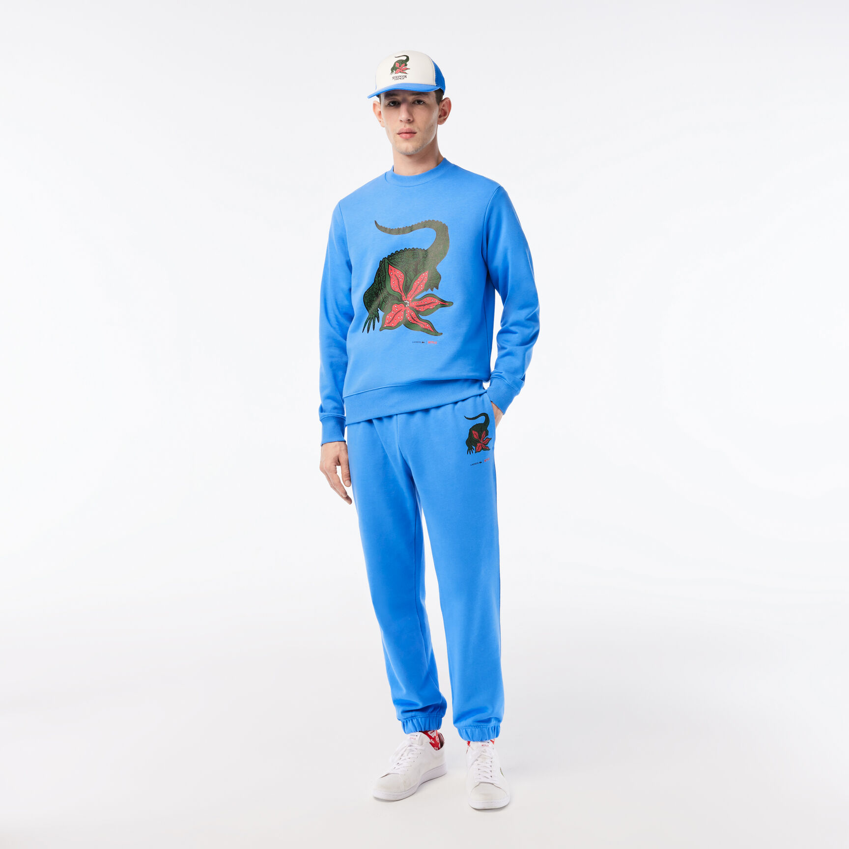 بنطال رياضي بطبعة تمساح للرجال مجموعة Lacoste x Netflix بنطال رياضي بطبعة تمساح للرجال مجموعة Lacoste x Netflix