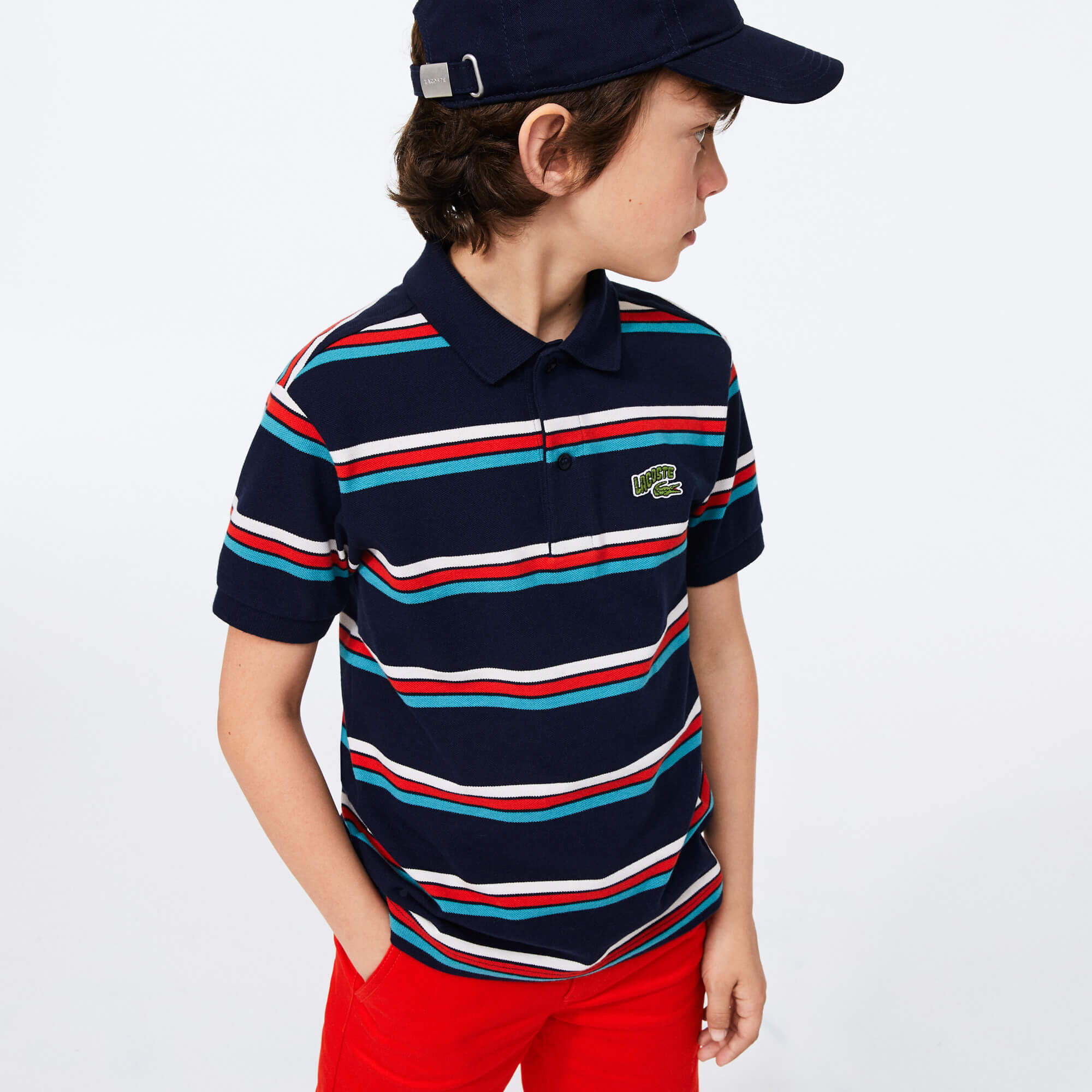 قميص بولو للصبيان مقلم من قطن بيكيه بعلامة Lacoste قميص بولو للصبيان مقلم من قطن بيكيه بعلامة Lacoste