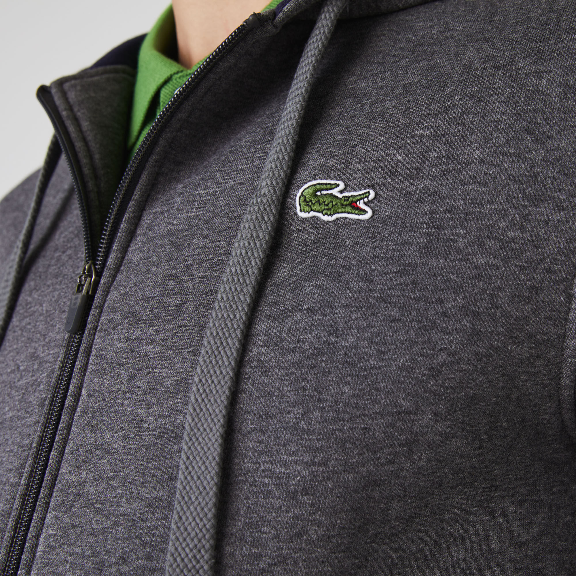 قميص ثقيل من الصوف مزود بغطاء للرأس بسحاب للرجال لرياضة التنس من مجموعة Lacoste SPORT قميص ثقيل من الصوف مزود بغطاء للرأس بسحاب للرجال لرياضة التنس من مجموعة Lacoste SPORT