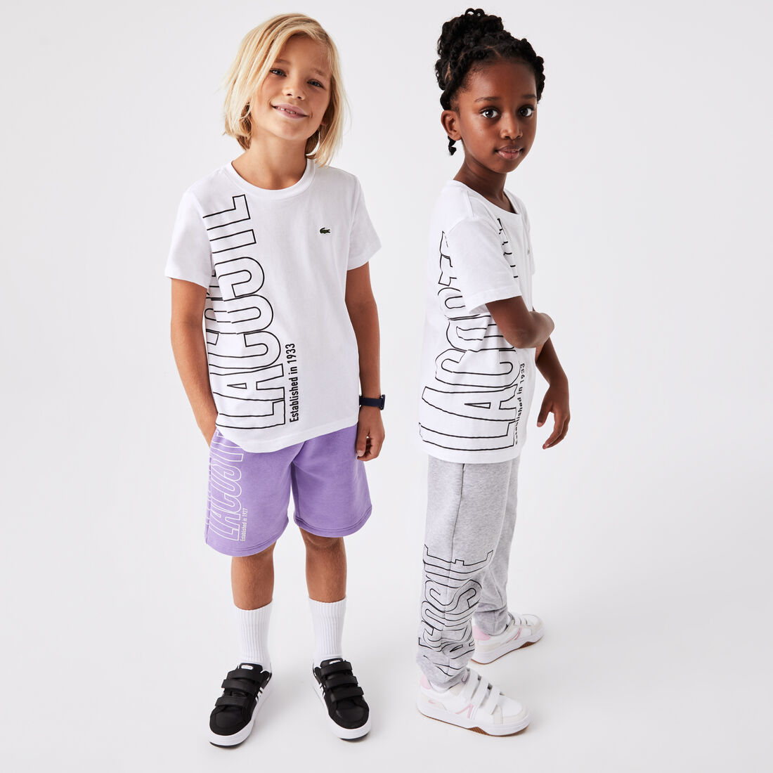 تيشيرت لاكوست قطن جيرسيه بطبعة كبيرة لشعار الماركة للأطفال تيشيرت لاكوست قطن جيرسيه بطبعة كبيرة لشعار الماركة للأطفال