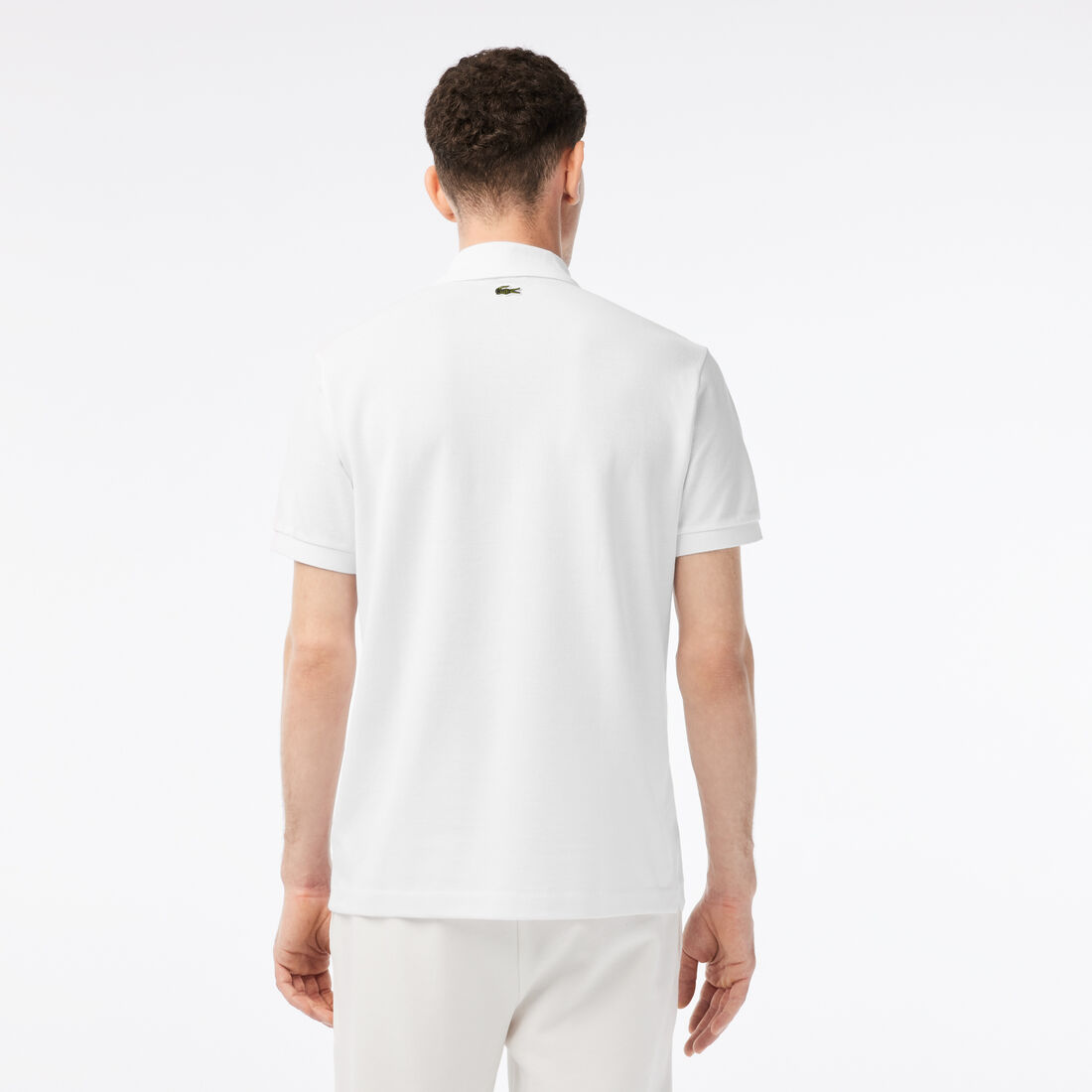 تيشيرت بولو قطن عضوي للرجال مجموعة Lacoste x Netflix تيشيرت بولو قطن عضوي للرجال مجموعة Lacoste x Netflix