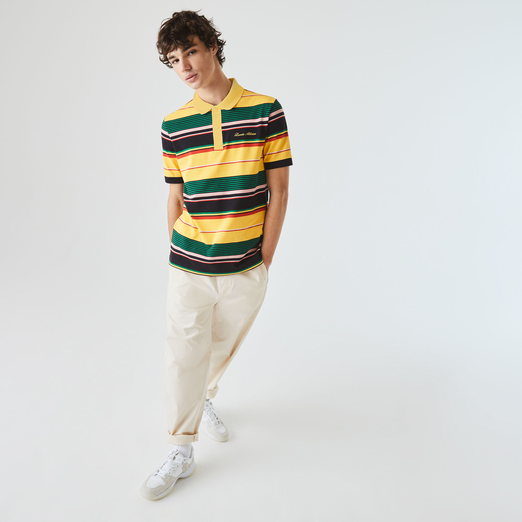 قميص بولو مقلم مطرز من بيكيه القطن مجموعة Lacoste LIVE للجنسين قميص بولو مقلم مطرز من بيكيه القطن مجموعة Lacoste LIVE للجنسين