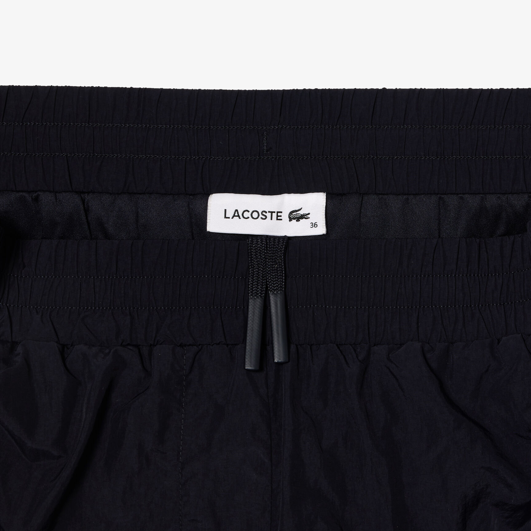 بنطال رياضي مبطن بنقشة شعار الماركة بنطال رياضي مبطن بنقشة شعار الماركة