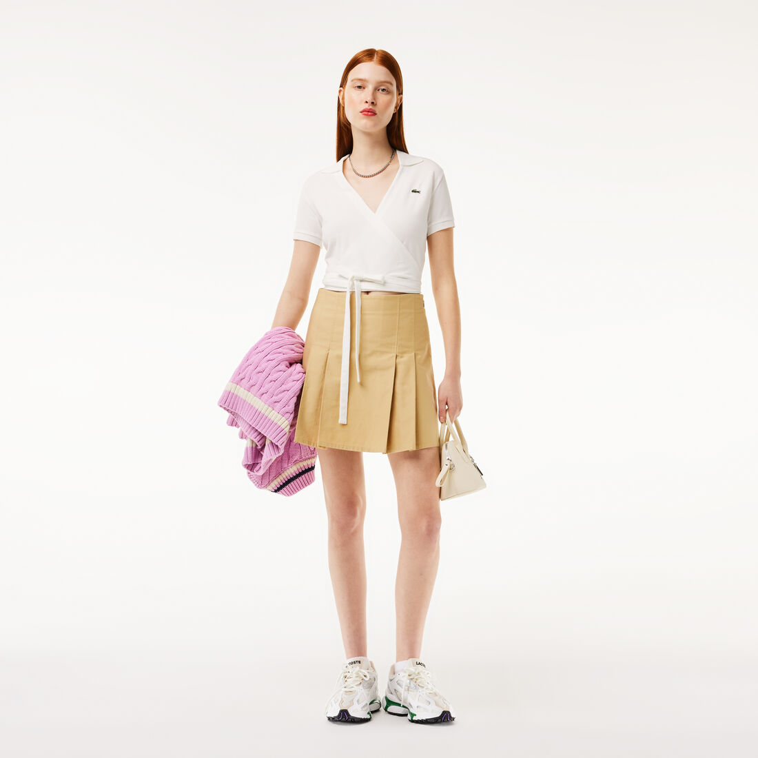 قميص بولو بيكيه مطاطي متقاطع قميص بولو بيكيه مطاطي متقاطع