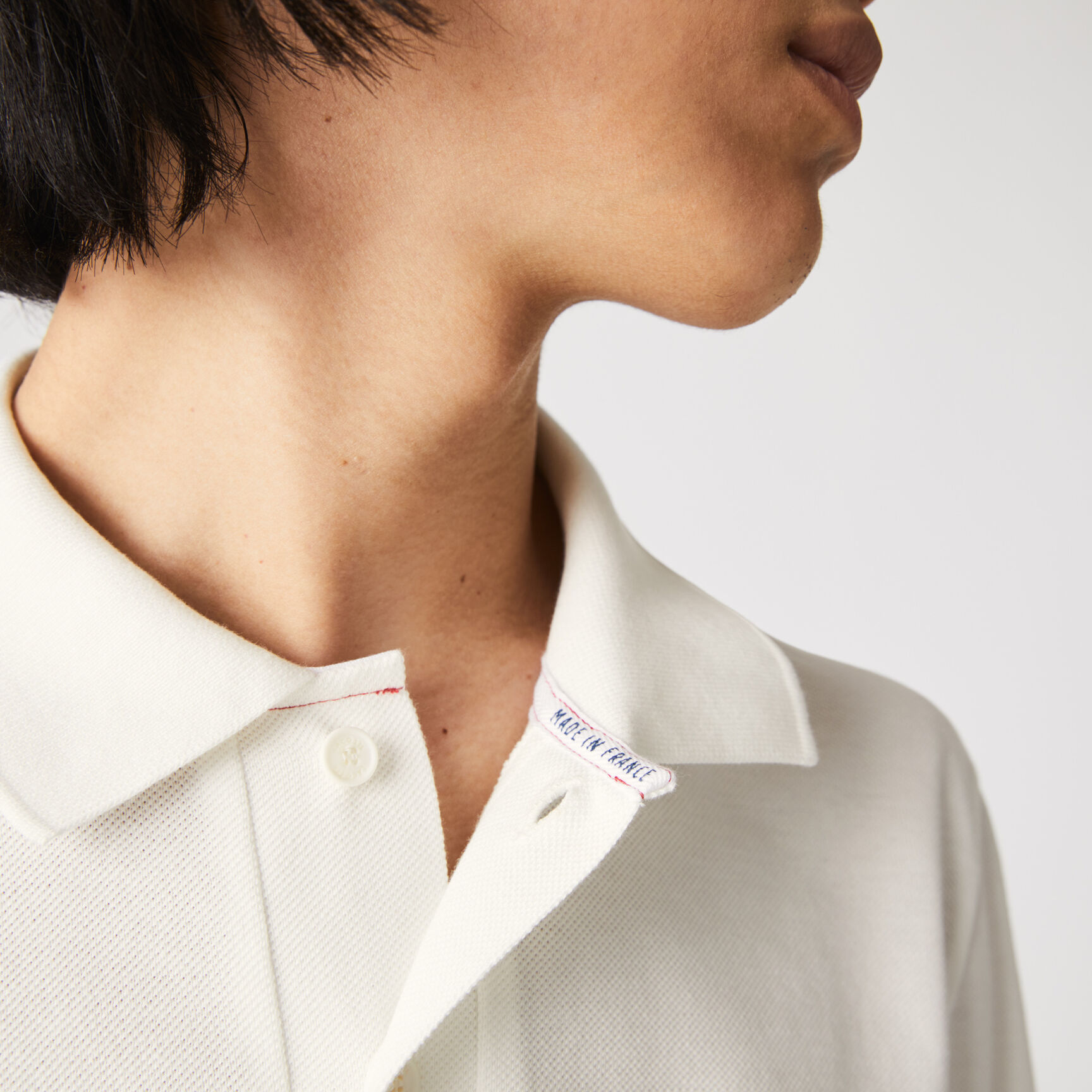 بولو Lacoste للرجال مصنوع في فرنسا بقصة عادية